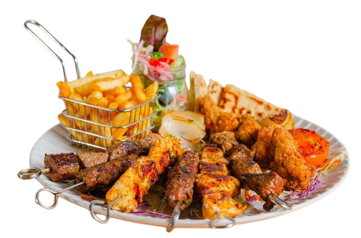 Mixed grill platter with kebabs, fries and salad