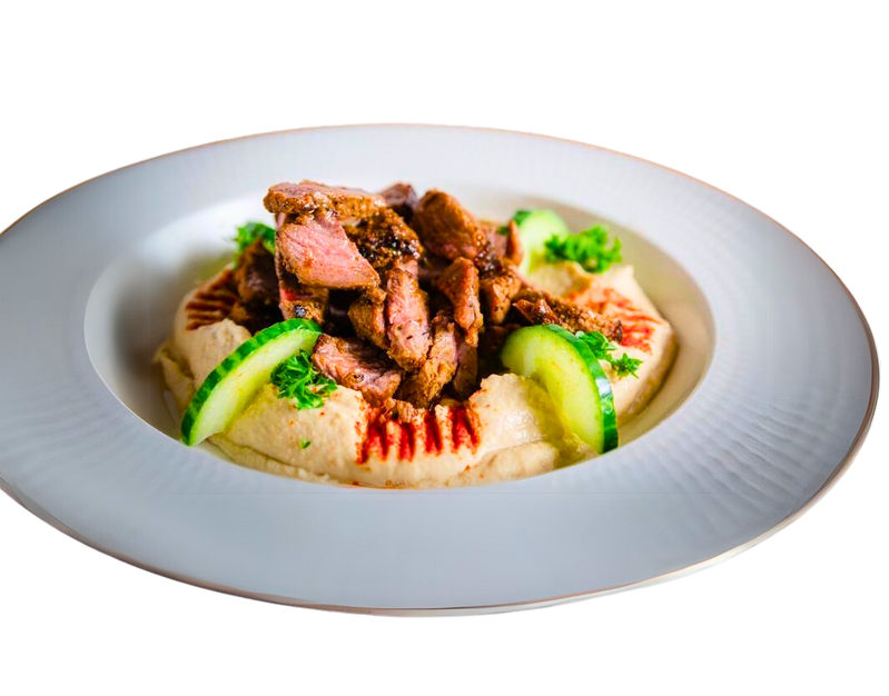 Grilled lamb on hummus